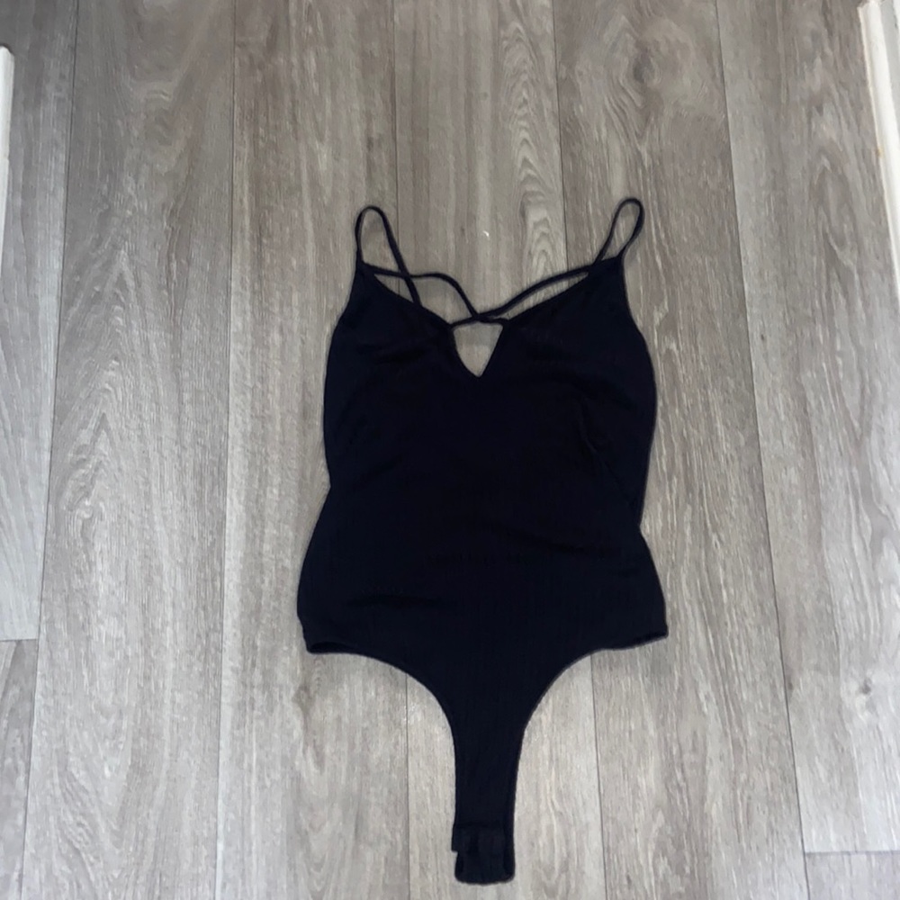 Wet seal ribbed body suit